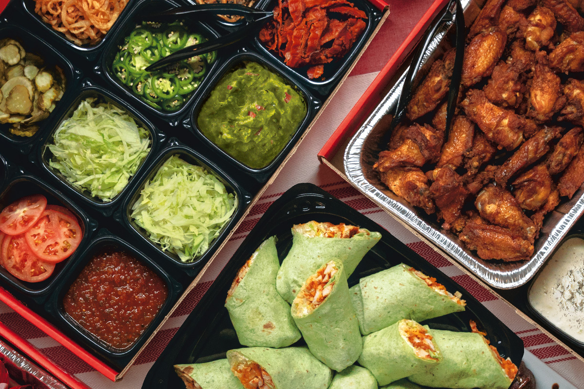 Catering spread with Burger Bar, Wing Bar and Wraps