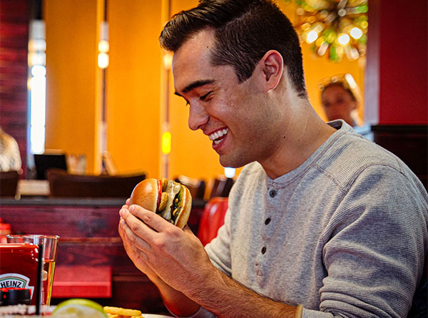 Guest enjoying Red Robin Royalty perks