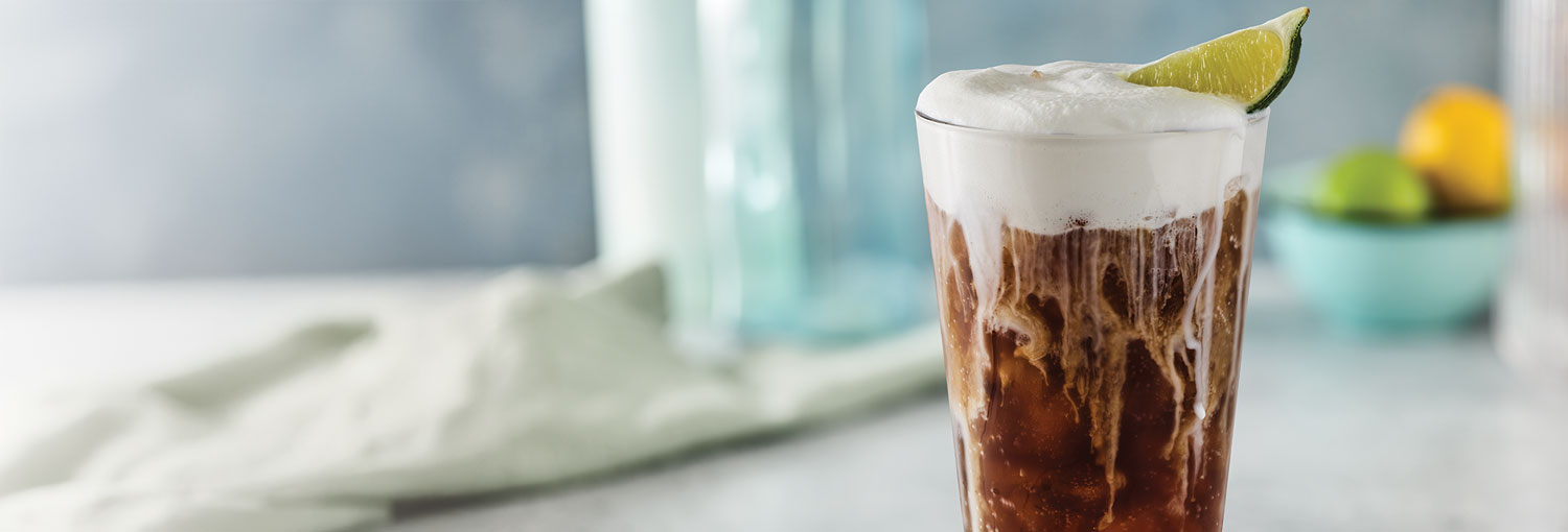 Kids Coconut Coca-Cola Fizzy Soda with cold foam