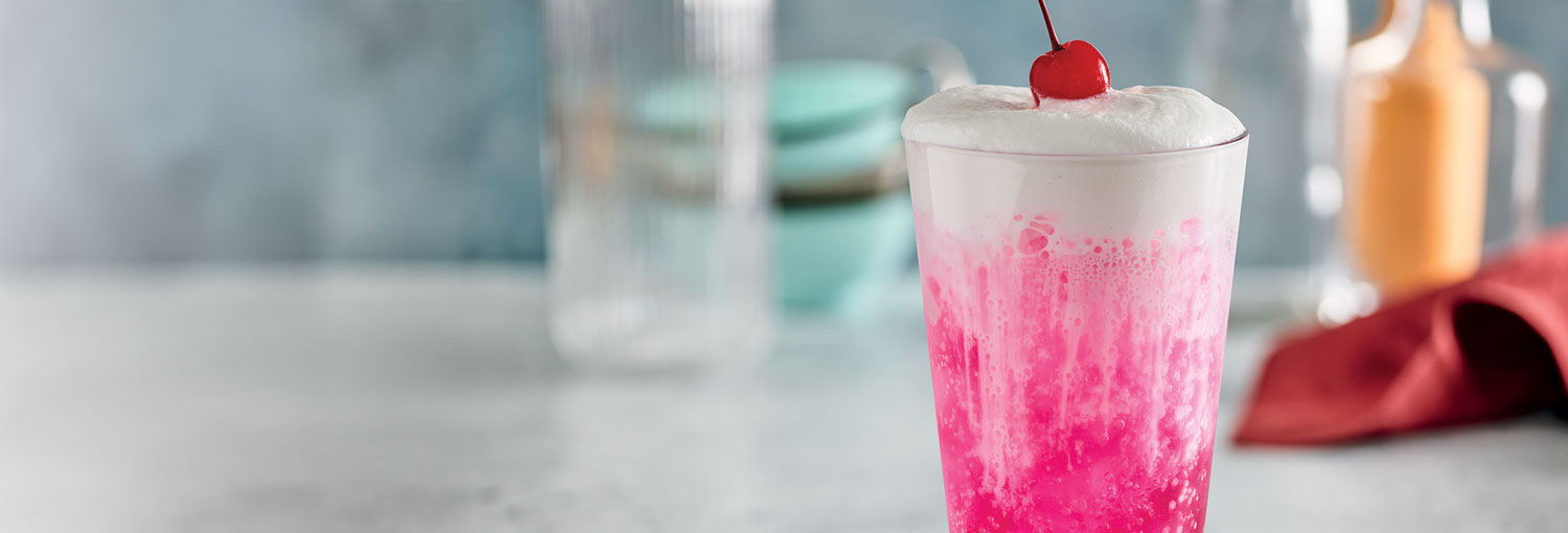 Dragon Fruit Fizzy Soda with cold foam