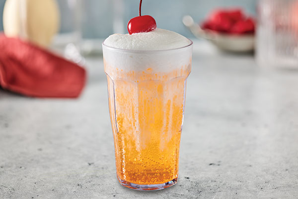 Kids Candied Orange Fizzy Soda with cold foam