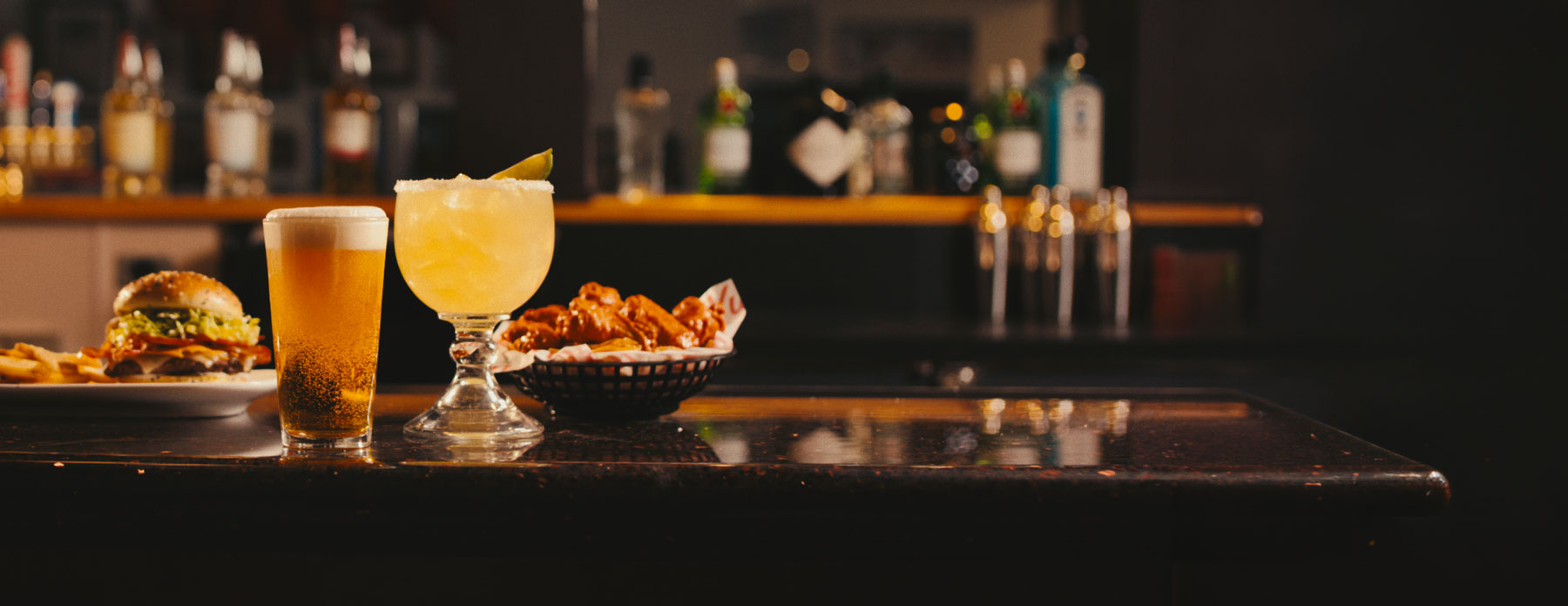 Beer and Margarita paired with a burger and wings