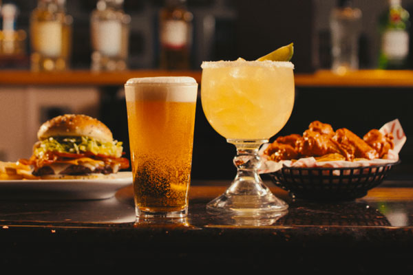 Beer and Margarita paired with a burger and wings