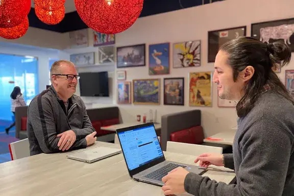 Team Members in a meeting at the Restaurant Support Center