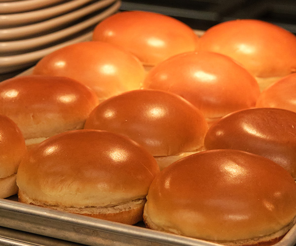 Brioche buns on sheet pan